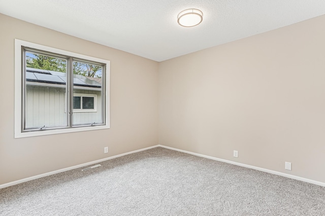 6535 Dawn Way, Inver Grove Heights, MN 55076 - unfurnished room featuring carpet flooring and baseboards