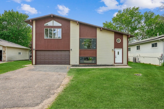 6535 Dawn Way, Inver Grove Heights, MN 55076 - view of front of property featuring asphalt driveway, an attached garage, and a front yard