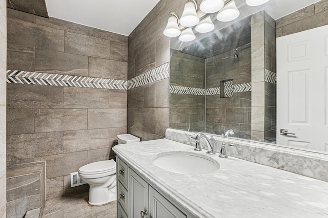 6535 Dawn Way, Inver Grove Heights, MN 55076 - full bathroom with a tile shower, vanity, tile walls, and a chandelier