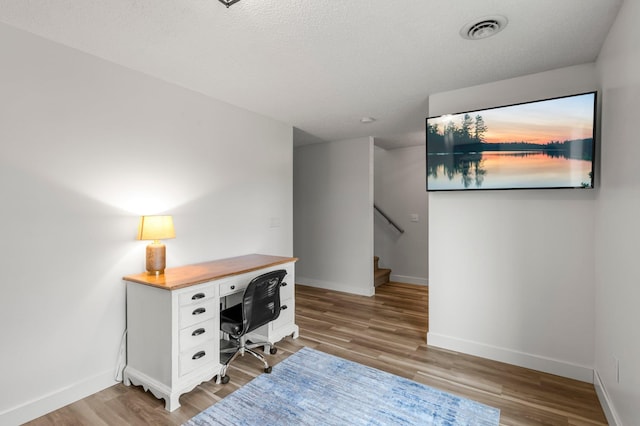 16047 72nd St NE, Otsego, MN 55330 - home office with baseboards and light wood-style flooring