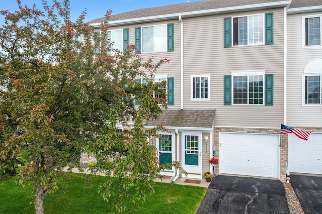 16047 72nd St NE, Otsego, MN 55330 - view of property with driveway, an attached garage, and a front yard