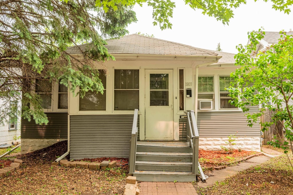 1807 Sims Ave, Saint Paul, MN 55119 - view of front of property featuring a shingled roof