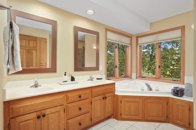 16976 81st Ave N, Maple Grove, MN 55311 - bathroom with double vanity, a bath, and tile patterned flooring