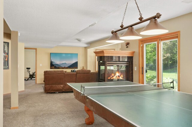16976 81st Ave N, Maple Grove, MN 55311 - rec room featuring a multi sided fireplace and carpet