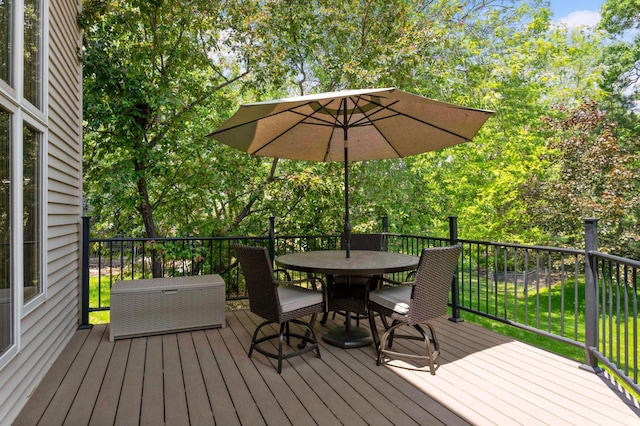 16976 81st Ave N, Maple Grove, MN 55311 - wooden terrace with outdoor dining space and view of scattered trees