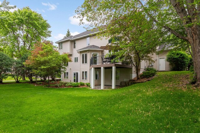 16976 81st Ave N, Maple Grove, MN 55311 - rear view of property featuring a wooden deck and a yard