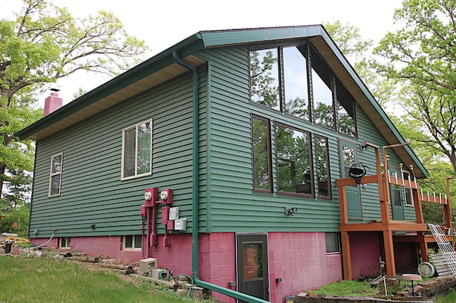 39817 Osage Dr, Browerville, MN 56438 - view of side of home with a chimney