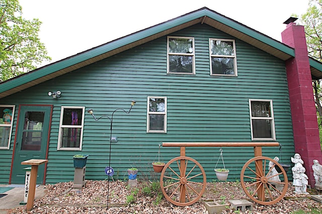 39817 Osage Dr, Browerville, MN 56438 - view of property exterior featuring a chimney