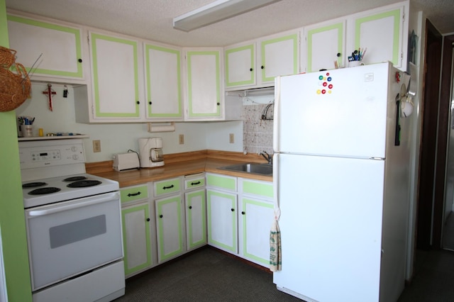 39817 Osage Dr, Browerville, MN 56438 - kitchen with white appliances, a sink, decorative backsplash, butcher block counters, and white cabinetry