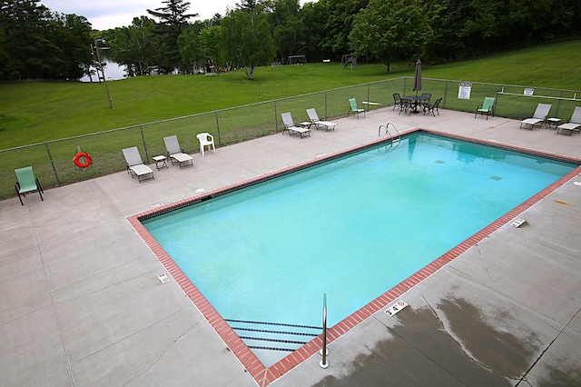 39817 Osage Dr, Browerville, MN 56438 - community pool featuring view of scattered trees and a patio