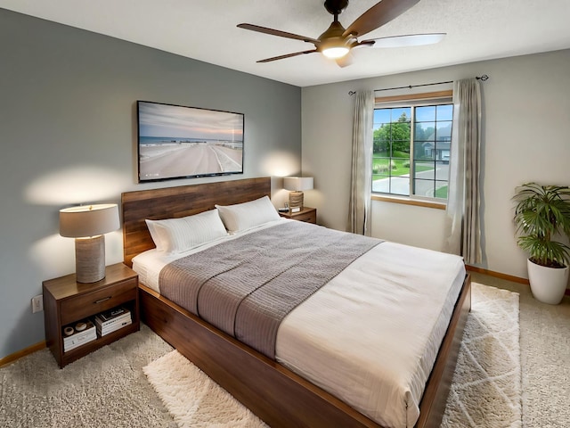 2002 Willow Cir, Centerville, MN 55038 - bedroom with carpet flooring, baseboards, and a ceiling fan