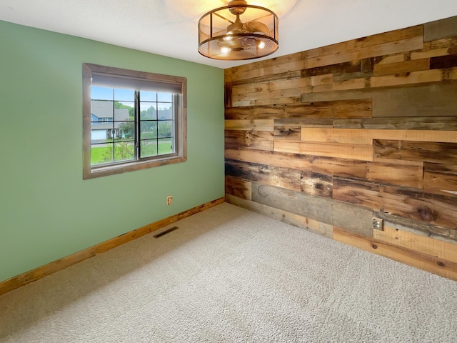 2002 Willow Cir, Centerville, MN 55038 - carpeted spare room with wooden walls and baseboards