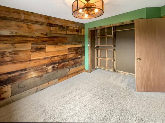 2002 Willow Cir, Centerville, MN 55038 - unfurnished bedroom featuring carpet floors and wooden walls