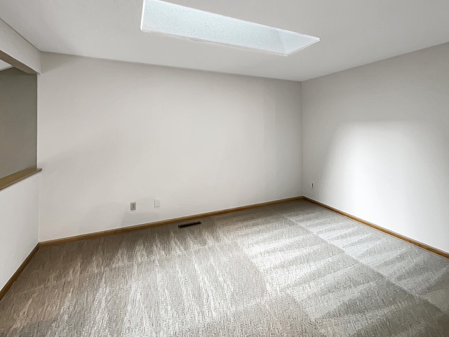 2002 Willow Cir, Centerville, MN 55038 - carpeted spare room with a skylight and baseboards