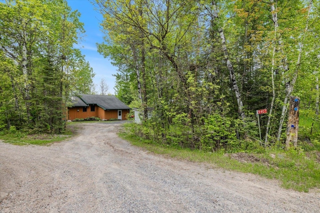 9407 St Odilia Beach Rd, Vermilion Lake Twp, MN 55790 - view of front of home with dirt driveway
