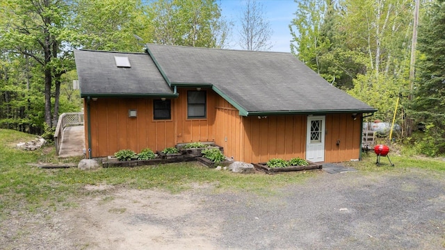 9407 St Odilia Beach Rd, Vermilion Lake Twp, MN 55790 - view of front of property with board and batten siding
