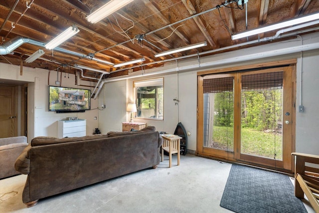 9407 St Odilia Beach Rd, Vermilion Lake Twp, MN 55790 - living area with concrete flooring