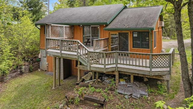 9407 St Odilia Beach Rd, Vermilion Lake Twp, MN 55790 - back of house with a wooden deck, a shingled roof, and board and batten siding