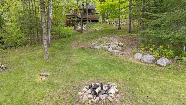 9407 St Odilia Beach Rd, Vermilion Lake Twp, MN 55790 - view of green lawn featuring a wooded view