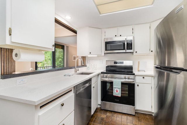 6085 Lincoln Dr Unit 220, Edina, MN 55436 - kitchen with stainless steel appliances, a sink, white cabinets, and recessed lighting