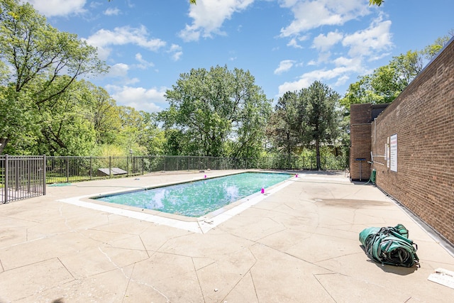 6085 Lincoln Dr Unit 220, Edina, MN 55436 - view of pool with a patio and view of scattered trees
