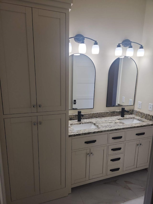 8800 86th Ave N, Greenfield, MN 55373 - bathroom with marble look tile flooring and double vanity
