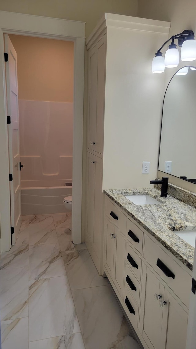 8800 86th Ave N, Greenfield, MN 55373 - bathroom featuring marble look tile flooring, double vanity, and shower / bath combination