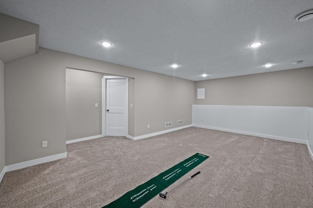 3825 122nd Ave NW, Coon Rapids, MN 55433 - finished below grade area featuring carpet, a textured ceiling, recessed lighting, and baseboards