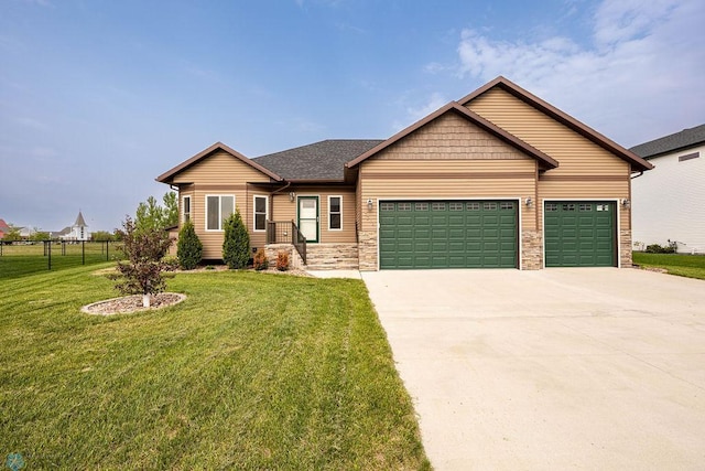 7214 Eagle Pointe Dr S, Fargo, ND 58104 - ranch-style house with a garage, concrete driveway, stone siding, and a shingled roof