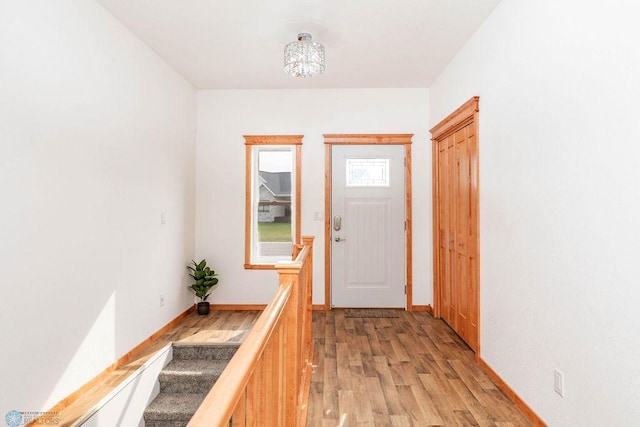 7214 Eagle Pointe Dr S, Fargo, ND 58104 - doorway to outside with light wood finished floors and baseboards