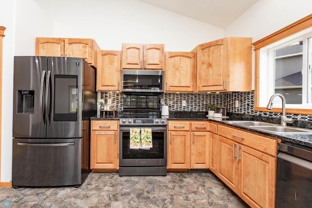 7214 Eagle Pointe Dr S, Fargo, ND 58104 - kitchen with appliances with stainless steel finishes, a sink, tasteful backsplash, light brown cabinets, and high vaulted ceiling