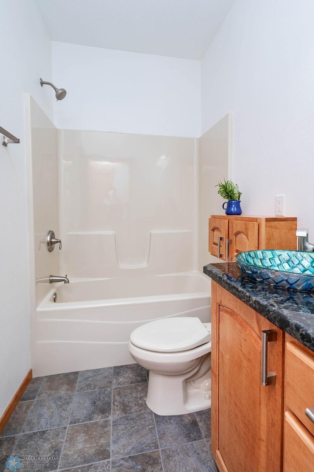 7214 Eagle Pointe Dr S, Fargo, ND 58104 - bathroom with toilet, shower / washtub combination, and vanity