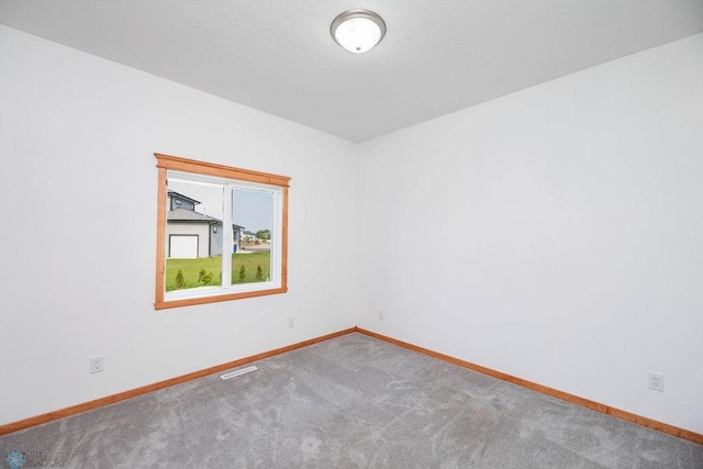 7214 Eagle Pointe Dr S, Fargo, ND 58104 - carpeted spare room with baseboards