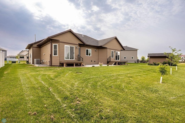 7214 Eagle Pointe Dr S, Fargo, ND 58104 - rear view of house featuring a yard and central AC