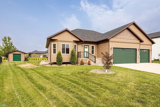 7214 Eagle Pointe Dr S, Fargo, ND 58104 - view of front facade featuring a garage, a front yard, concrete driveway, and roof with shingles