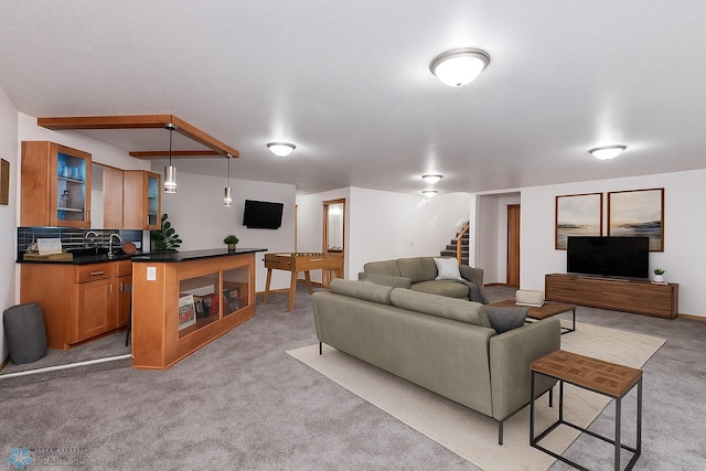 7214 Eagle Pointe Dr S, Fargo, ND 58104 - living room with stairway, light carpet, and baseboards