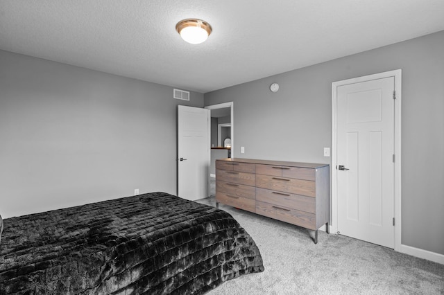 9842 51st St NE, Saint Michael, MN 55376 - bedroom with light carpet, a textured ceiling, and baseboards