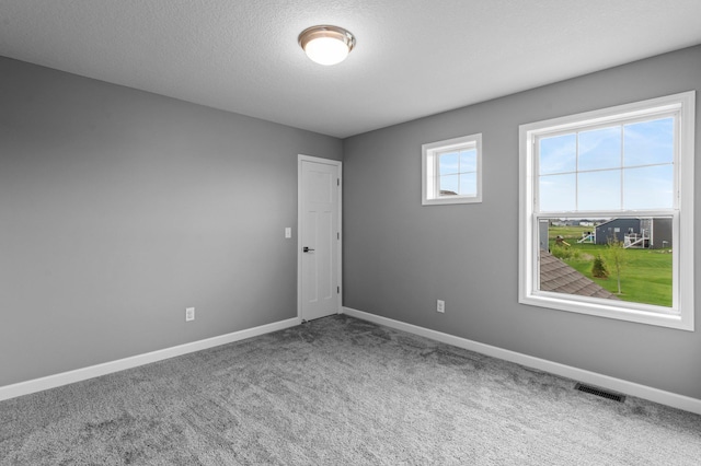 9842 51st St NE, Saint Michael, MN 55376 - carpeted spare room featuring baseboards