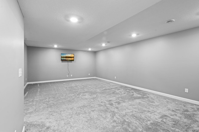 9842 51st St NE, Saint Michael, MN 55376 - carpeted spare room featuring recessed lighting, baseboards, and a textured ceiling