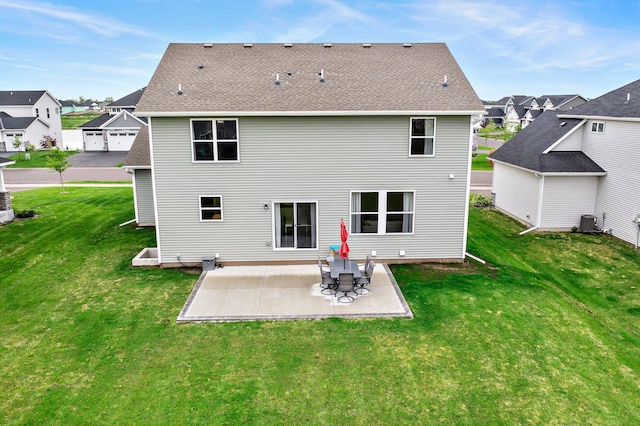 9842 51st St NE, Saint Michael, MN 55376 - back of property featuring a yard, a patio, a residential view, and roof with shingles