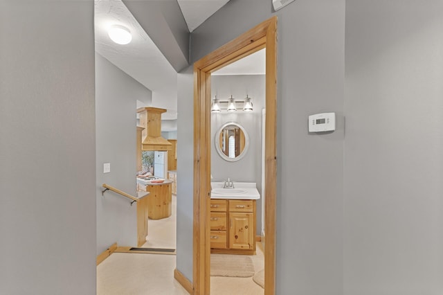 22165 Harlow Ave, Helena Twp, MN 55352 - hallway with a sink and baseboards