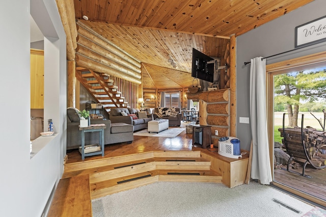 22165 Harlow Ave, Helena Twp, MN 55352 - living area featuring log walls and wooden ceiling