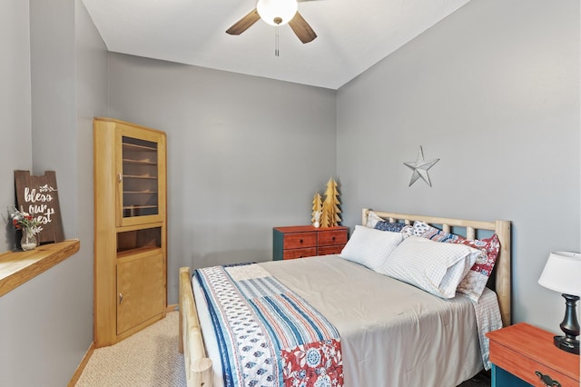 22165 Harlow Ave, Helena Twp, MN 55352 - bedroom with light carpet, baseboards, and ceiling fan