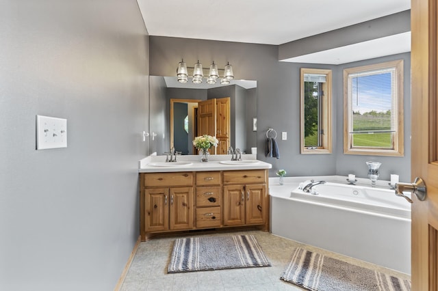 22165 Harlow Ave, Helena Twp, MN 55352 - full bathroom featuring double vanity, a bath, and baseboards