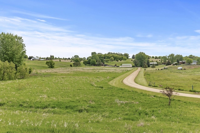 22165 Harlow Ave, Helena Twp, MN 55352 - surrounding community with a rural view and a lawn
