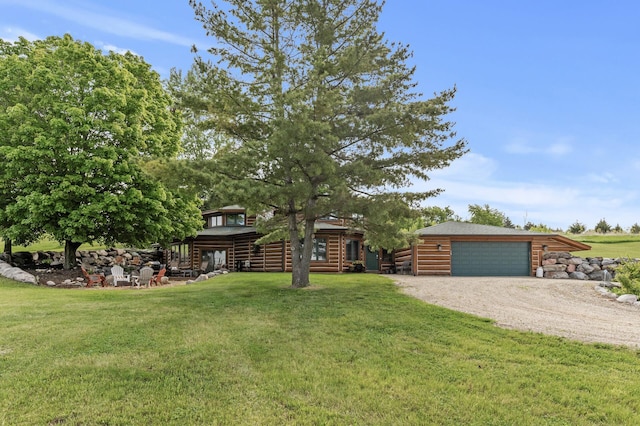 22165 Harlow Ave, Helena Twp, MN 55352 - log cabin featuring a front yard, dirt driveway, and a garage