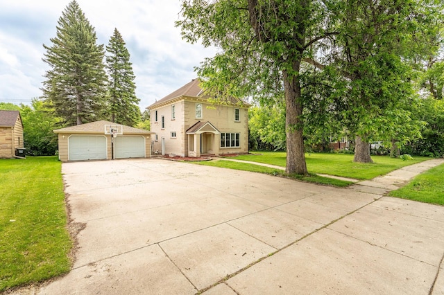 113 7th Ave SE, Elbow Lake, MN 56531 - view of front facade with an outbuilding, a detached garage, and a front lawn