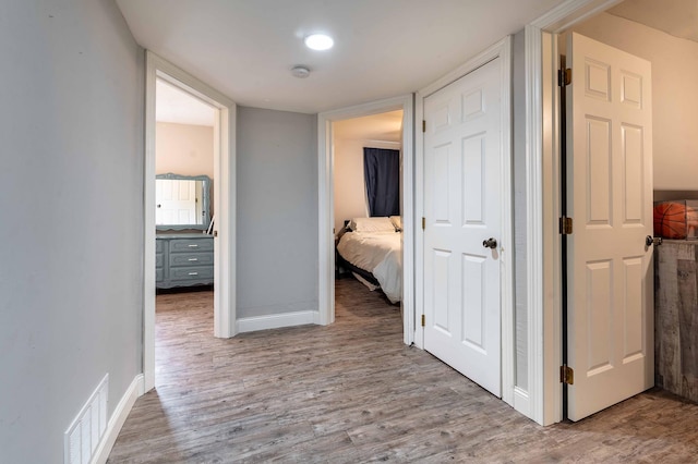 113 7th Ave SE, Elbow Lake, MN 56531 - hall with wood finished floors and baseboards