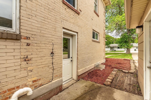 113 7th Ave SE, Elbow Lake, MN 56531 - view of exterior entry with brick siding