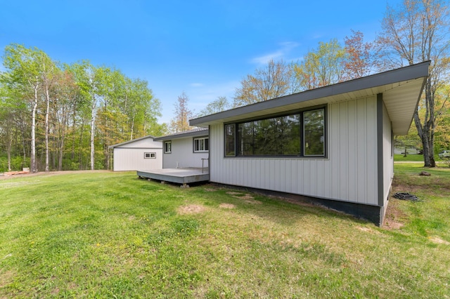 185 Wagon Rd, Esko, MN 55733 - rear view of property with a wooden deck and a yard